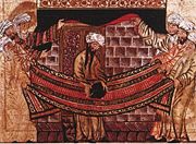 The earliest surviving image of Muhammad from Rashid al-Din's Jami' al-Tawarikh, approximately 1315, depicting the episode of the Black Stone.